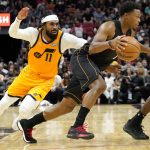 
              Miami Heat guard Kyle Lowry, right, drives to the basket as Utah Jazz guard Mike Conley (11) defends during the second half of an NBA basketball game, Saturday, Nov. 6, 2021, in Miami. (AP Photo/Lynne Sladky)
            