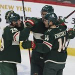 
              Minnesota Wild center Joel Eriksson Ek (14) celebrates with teammates after scoring a goal during the first period of the team's NHL hockey game against the Arizona Coyotes, Tuesday, Nov. 30, 2021, in St. Paul, Minn. (AP Photo/Stacy Bengs)
            