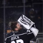 
              Los Angeles Kings goaltender Jonathan Quick (32) sprays water onto his face before the team's NHL hockey game against the St. Louis Blues on Wednesday, Nov. 3, 2021, in Los Angeles. (AP Photo/Kyusung Gong)
            