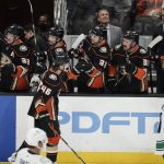 
              Anaheim Ducks' Trevor Zegras (46) celebrates his goal with teammates during the second period of an NHL hockey game against the Vancouver Canucks, Sunday, Nov. 14, 2021, in Anaheim , Calif. (AP Photo/Jae C. Hong)
            