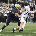 
              Navy's Diego Fagot pressures East Carolina quarterback Holton Ahlers during the second quarter during an NCAA college football game Saturday, Nov. 20, 2021, in Annapolis, Md. (Paul W. Gillespie/The Baltimore Sun via AP)
            