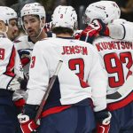 
              Washington Capitals right wing Tom Wilson, second from left, celebrates his goal against the Seattle Kraken with teammates during the first period of an NHL hockey game, Sunday, Nov. 21, 2021, in Seattle. (AP Photo/Lindsey Wasson)
            