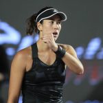 
              Garbiñe Muguruza, of Spain, reacts during the final match against Anett Kontaveit, of Estonia, of the WTA Finals tennis tournament in Guadalajara, Mexico, Wednesday, Nov. 17, 2021. (AP Photo/Refugio Ruiz)
            