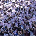 
              Colorado Rapids fans wave flags to welcome their team to the pitch to face the Portland Timbers before an MLS Western Conference semifinal playoff soccer match Thursday, Nov. 25, 2021, in Commerce City, Colo. (AP Photo/David Zalubowski)
            