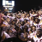 
              Virginia Tech players pose for a photograph after a win over Virginia in an NCAA college football game Saturday, Nov. 27, 2021, in Charlottesville, Va. (Matt Gentry/The Roanoke Times via AP)
            