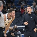 
              Brooklyn Nets coach Steve Nash, right, argues with official Scott Wall, left, as forward Blake Griffin (2) listens during the first half of the team's NBA basketball game against the Orlando Magic, Wednesday, Nov. 10, 2021, in Orlando, Fla. (AP Photo/Phelan M. Ebenhack)
            