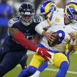 
              Tennessee Titans defensive end Jeffery Simmons, left, sacks Los Angeles Rams quarterback Matthew Stafford during the first half of an NFL football game Sunday, Nov. 7, 2021, in Inglewood, Calif. (AP Photo/Ashley Landis)
            