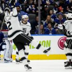 
              Los Angeles Kings left wing Phillip Danault (24) celebrates his goal with teammates during the second period of an NHL hockey game against the Toronto Maple Leafs, in Toronto, Monday, Nov. 8, 2021. (Frank Gunn/The Canadian Press via AP)
            