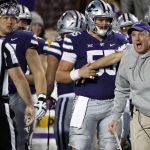 
              Kansas State head coach Chris Klieman, right, yells at an official after his team was flagged for interfering on a fair catch on a punt during the first half of an NCAA college football game against Baylor on Saturday, Nov. 20, 2021 in Manhattan, Kan. (AP Photo/Colin E. Braley)
            