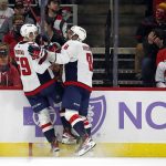 
              Washington Capitals' Aliaksei Protas (59) celebrates his goal with teammate Alex Ovechkin (8) during the second period of an NHL hockey game against the Carolina Hurricanes in Raleigh, N.C., Sunday, Nov. 28, 2021. (AP Photo/Karl B DeBlaker)
            