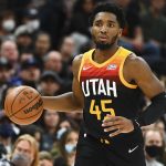 
              Utah Jazz guard Donovan Mitchell brings the ball up during the first half of the team's NBA basketball game against the New Orleans Pelicans on Saturday, Nov. 27, 2021, in Salt Lake City. (AP Photo/Alex Goodlett)
            