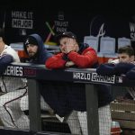 
              Members of the Atlanta Braves watch during the ninth inning in Game 5 of baseball's World Series between the Houston Astros and the Atlanta Braves Monday, Nov. 1, 2021, in Atlanta. The Astros won 9-5. The Braves lead the series 3-2 games. (AP Photo/Ashley Landis)
            