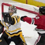 
              Pittsburgh Penguins' Tristan Jarry makes a glove save on a shot by Chicago Blackhawks' Alex DeBrincat during the second period of an NHL hockey game Tuesday, Nov. 9, 2021, in Chicago. (AP Photo/Charles Rex Arbogast)
            