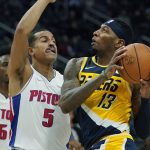 
              Indiana Pacers forward Torrey Craig (13) is defended by Detroit Pistons guard Frank Jackson (5) defends during the second half of an NBA basketball game, Wednesday, Nov. 17, 2021, in Detroit. (AP Photo/Carlos Osorio)
            