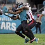 
              Atlanta Falcons cornerback A.J. Terrell, front right, breaks up a pass intended for Jacksonville Jaguars wide receiver Marvin Jones Jr., left, during the second half of an NFL football game, Sunday, Nov. 28, 2021, in Jacksonville, Fla. (AP Photo/Phelan M. Ebenhack)
            