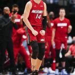 
              Miami Heat guard Tyler Herro (14) celebrates a 3-point shot during the first half of the team's NBA basketball game against the Dallas Mavericks on Tuesday, Nov. 2, 2021, in Dallas. (AP Photo/Brandon Wade)
            