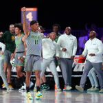 
              In this photo provided by Bahamas Visual Services, Baylor guard James Akinjo (11)  reacts after a basket against Michigan State during an NCAA college basketball game at Paradise Island, Bahamas, Friday, Nov. 26, 2021. (Tim Aylen/Bahamas Visual Services via AP)
            