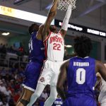 
              Ohio State guard Malachi Branham (22) drives past Seton Hall center Ike Obiagu (21) to the basket during the second half of an NCAA college basketball game Monday, Nov. 22, 2021, in Fort Myers, Fla. (AP Photo/Scott Audette)
            