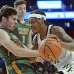
              William & Mary's Connor Kochera, left, is called for a block as Wake Forest's Alondes Williams drives to the basket in the first half of an NCAA college basketball game, Wednesday, Nov. 10, 2021 at Joel Coliseum in Winston-Salem, N.C. (Walt Unks/The Winston-Salem Journal via AP)
            
