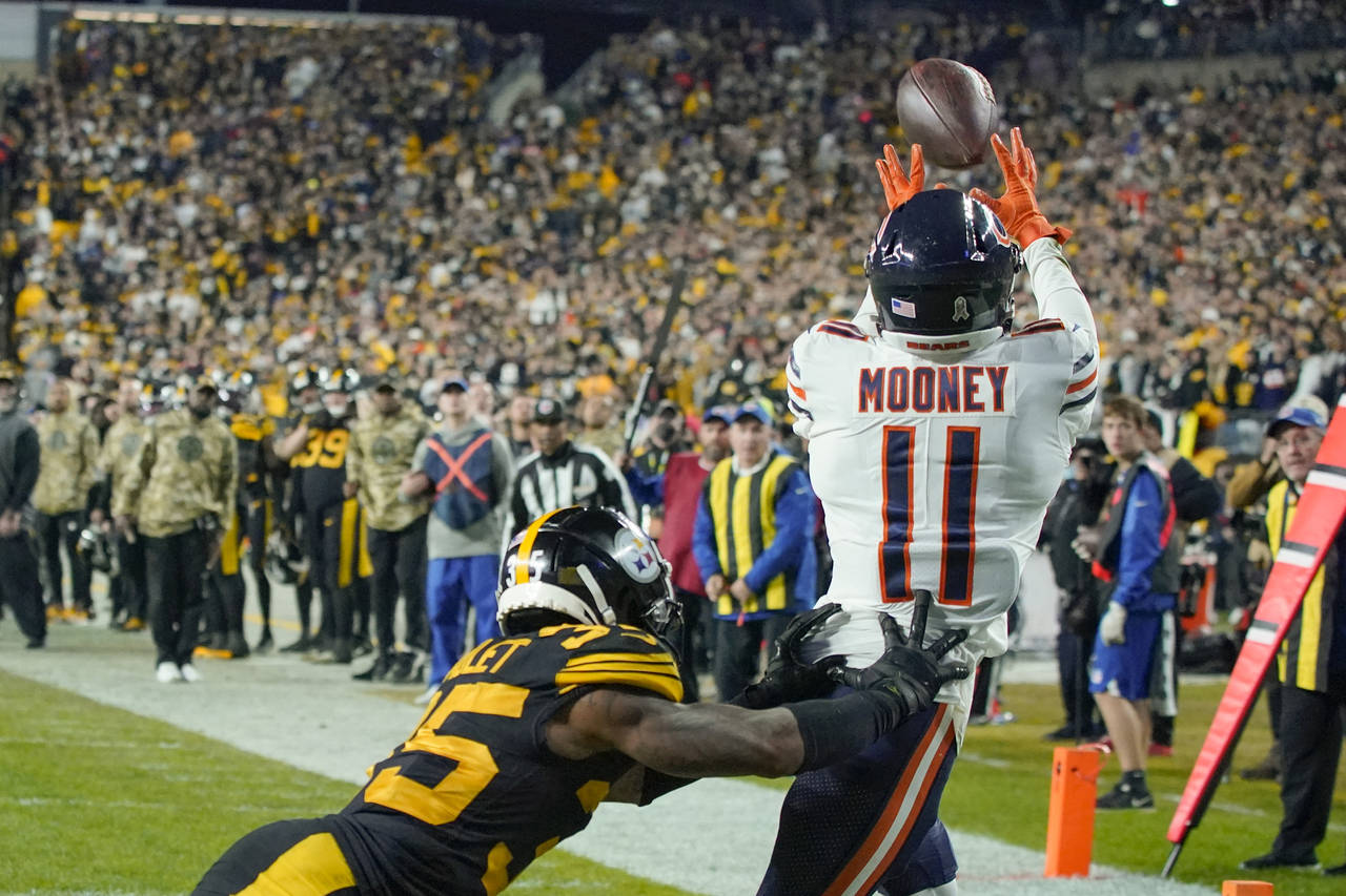 Chicago Bears wide receiver Darnell Mooney (11) makes a touchdown catch past Pittsburgh Steelers co...