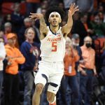 
              Illinois' Andre Curbelo passes the ball during the first half of an NCAA college basketball game against Arkansas State Friday, Nov. 12, 2021, in Champaign, Ill. (AP Photo/Michael Allio)
            