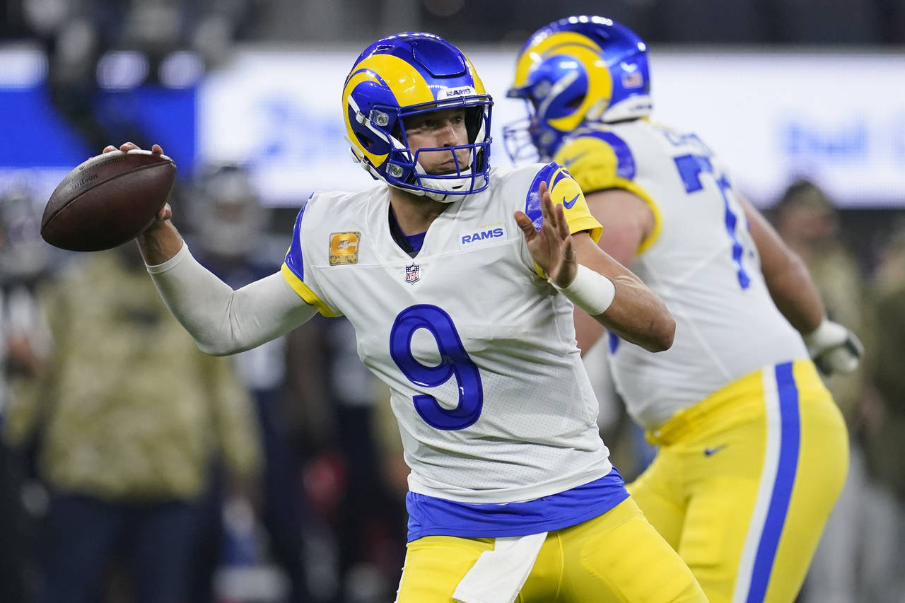 Los Angeles Rams quarterback Matthew Stafford throws a pass during the first half of an NFL footbal...