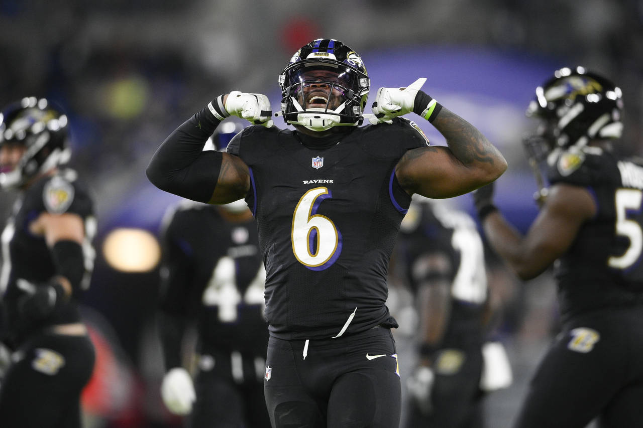 Baltimore Ravens inside linebacker Patrick Queen reacts after making a tackle on Cleveland Browns r...