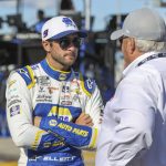 
              FILE - NASCAR Cup Series driver Chase Elliott, left, talks to Rick Hendrick on pit road before a NASCAR Cup Series auto race at Charlotte Motor Speedway in Concord, N.C., Sunday, May 30, 2021. The NASCAR championship will pit Rick Hendrick against Joe Gibbs as both team owners put a pair of drivers in the final four. Chase Elliott and Kyle Larson will represent Hendrick in a pair of Chevrolets. Gibbs will field Toyotas for Denny Hamlin and Martin Truex Jr. (AP Photo/Nell Redmond, File)
            