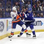 
              Tampa Bay Lightning's Victor Hedman (77) checks New York Islanders' Kyle Palmieri during the first period of an NHL hockey game Monday, Nov. 15, 2021, in Tampa, Fla. (AP Photo/Mike Carlson)
            