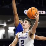 
              Northwestern guard Ryan Greer (2) drives to the basket against Eastern Illinois forward Barlow Alleruzzo IV during the second half of an NCAA college basketball game in Evanston, Ill., Tuesday, Nov. 9, 2021. (AP Photo/Nam Y. Huh)
            