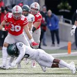 
              Ohio State tight end Jeremy Ruckert, left, tries to run past Michigan State defensive back Angelo Grose during the first half of an NCAA college football game Saturday, Nov. 20, 2021, in Columbus, Ohio. (AP Photo/Jay LaPrete)
            
