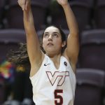 
              Virginia Tech's Georgia Amoore (5) follows through on a shot against Coppin State during in the first half of an NCAA college basketball game in Blacksburg Va., Wednesday, Nov. 17 2021. (Matt Gentry/The Roanoke Times via AP)
            