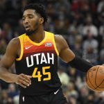 
              Utah Jazz guard Donovan Mitchell brings the ball up during the first half of the team's NBA basketball game against the New Orleans Pelicans on Friday, Nov. 26, 2021, in Salt Lake City. (AP Photo/Alex Goodlett)
            