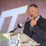 
              FILE - Virginia Tech head coach Justin Fuente answers a question during an NCAA college football news conference at the Atlantic Coast Conference media days in Charlotte, N.C., Wednesday, July 21, 2021. Virginia Tech and football coach Justin Fuente have mutually agreed to part ways with two games left in his sixth season with the Hokies. In a statement, athletic director Whit Babcock said co-defensive line coach and recruiting coordinator J,C. Price will lead the Hokies through their final two regular season games.  (AP Photo/Nell Redmond, File)
            