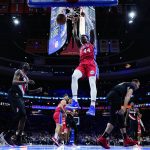 
              Philadelphia 76ers' Paul Reed (44) dunks the ball during the first half of an NBA basketball game against the Portland Trail Blazers, Monday, Nov. 1, 2021, in Philadelphia. (AP Photo/Matt Slocum)
            