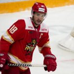 
              Kunlun Red Star's Brandon Yip in action during the Kontinental Hockey League ice hockey match between Kunlun Red Star Beijing and Amur Khabarovsk in Mytishchi, just outside Moscow, Russia, Monday, Nov. 15, 2021. Many of Kunlun Red Star's players are aiming to represent the Chinese national team at the Olympics in Beijing. (AP Photo/Alexander Zemlianichenko)
            