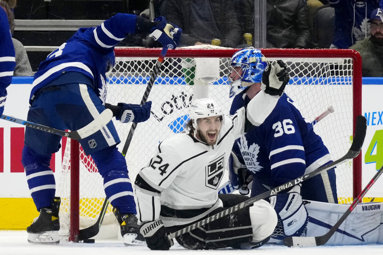 Los Angeles Kings left wing Phillip Danault (24) celebrates his goal as Toronto Maple Leafs goalten...