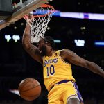 
              Los Angeles Lakers center DeAndre Jordan dunks the ball during the first half of an NBA basketball game against the Charlotte Hornets in Los Angeles, Monday, Nov. 8, 2021. (AP Photo/Ashley Landis)
            