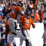 
              Denver Broncos quarterback Teddy Bridgewater (5) celebrates his touchdown run with wide receiver Courtland Sutton (14) during the first half of an NFL football game against the Los Angeles Chargers, Sunday, Nov. 28, 2021, in Denver. (AP Photo/Jack Dempsey)
            