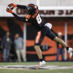 
              Oregon State wide receiver Trevon Bradford (8) catches a pass from quarterback Chance Nolan during the second half of an NCAA college football game against Stanford on Saturday, Nov. 13, 2021, in Corvallis, Ore. Oregon State won 35-14. (AP Photo/Amanda Loman)
            
