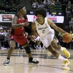 
              Baylor guard Kendall Brown (2) drives past Incarnate Word guard Brandon Swaby (5) in the second half of an NCAA college basketball game, Friday, Nov. 12, 2021, in Waco, Texas. (AP Photo/Jerry Larson)
            