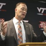 
              Virginia Tech athletic director Whit Babcock speaks during a press conference in Blacksburg, Va., Tuesday, Nov. 16, 2021. Virginia Tech and NCAA college football coach Justin Fuente have mutually agreed to part ways with two games left in his sixth season with the Hokies. (Matt Gentry/The Roanoke Times via AP)
            