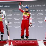 
              First place finisher Matthias Mayer, of Austria, celebrates on the podium with second place finisher Austria's Vincent Kriechmayr, left, and third place finisher Switzerland's Beat Feuz after the men's World Cup downhill ski race in Lake Louise, Alberta, Saturday, Nov. 27, 2021. (Jeff McIntosh/The Canadian Press via AP)
            