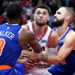 
              Chicago Bulls guard Zach LaVine, center, battles for the ball against New York Knicks guards Kemba Walker, left, and Evan Fournier during the second half of an NBA basketball game Thursday, Oct. 28, 2021, in Chicago. (AP Photo/Nam Y. Huh)
            
