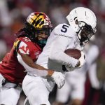 
              Penn State wide receiver Jahan Dotson, right, is tackled by Maryland defensive back Tarheeb Still after making a catch during the second half of an NCAA college football game, Saturday, Nov. 6, 2021, in College Park, Md. Penn State won 31-14. (AP Photo/Julio Cortez)
            
