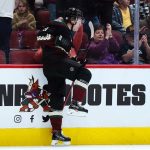 
              Arizona Coyotes right wing Clayton Keller celebrates his goal against the Edmonton Oilers during the first period of an NHL hockey game Wednesday, Nov. 24, 2021, in Glendale, Ariz. (AP Photo/Ross D. Franklin)
            