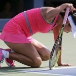 
              FILE - Peng Shuai, of China, drops to her knees in pain during the semifinals of the 2014 U.S. Open tennis tournament against Caroline Wozniacki, of Denmark, on Sept. 5, 2014, in New York. Struggling to stay upright as suffocating heat and humidity drained her energy in the U.S. Open semifinals, Peng Shuai refused to give up. She paused between points to clutch at her left thigh and put her weight on her racket as if it were a cane. Helped off the court and diagnosed with heat stroke, doctors told her to quit. But Peng still came back for more. Six more points until she eventually collapsed to the ground and Caroline Wozniacki, her opponent in that 2014 match, came around the net to check on her. Only then, with her body pushed to the absolute limit -- maybe even beyond the limit -- did Peng retire from the match that marked the pinnacle of her singles career. (AP Photo/Mike Groll)
            