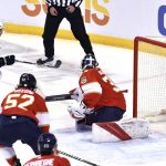 
              Seattle Kraken right wing Jordan Eberle (7) scores a goal past Florida Panthers goaltender Spencer Knight (30) during the first period of an NHL hockey game Saturday, Nov. 27, 2021, in Sunrise, Fla. (AP Photo/Jim Rassol)
            