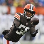 
              Cleveland Browns outside linebacker Malcolm Smith (56) intercepts a pass during the first half of an NFL football game against the Detroit Lions, Sunday, Nov. 21, 2021, in Cleveland. (AP Photo/Ron Schwane)
            
