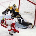 
              Detroit Red Wings' Filip Zadina (11) scores on Boston Bruins' Linus Ullmark (35) during the second period of an NHL hockey game Tuesday, Nov. 30, 2021, in Boston. (AP Photo/Michael Dwyer)
            